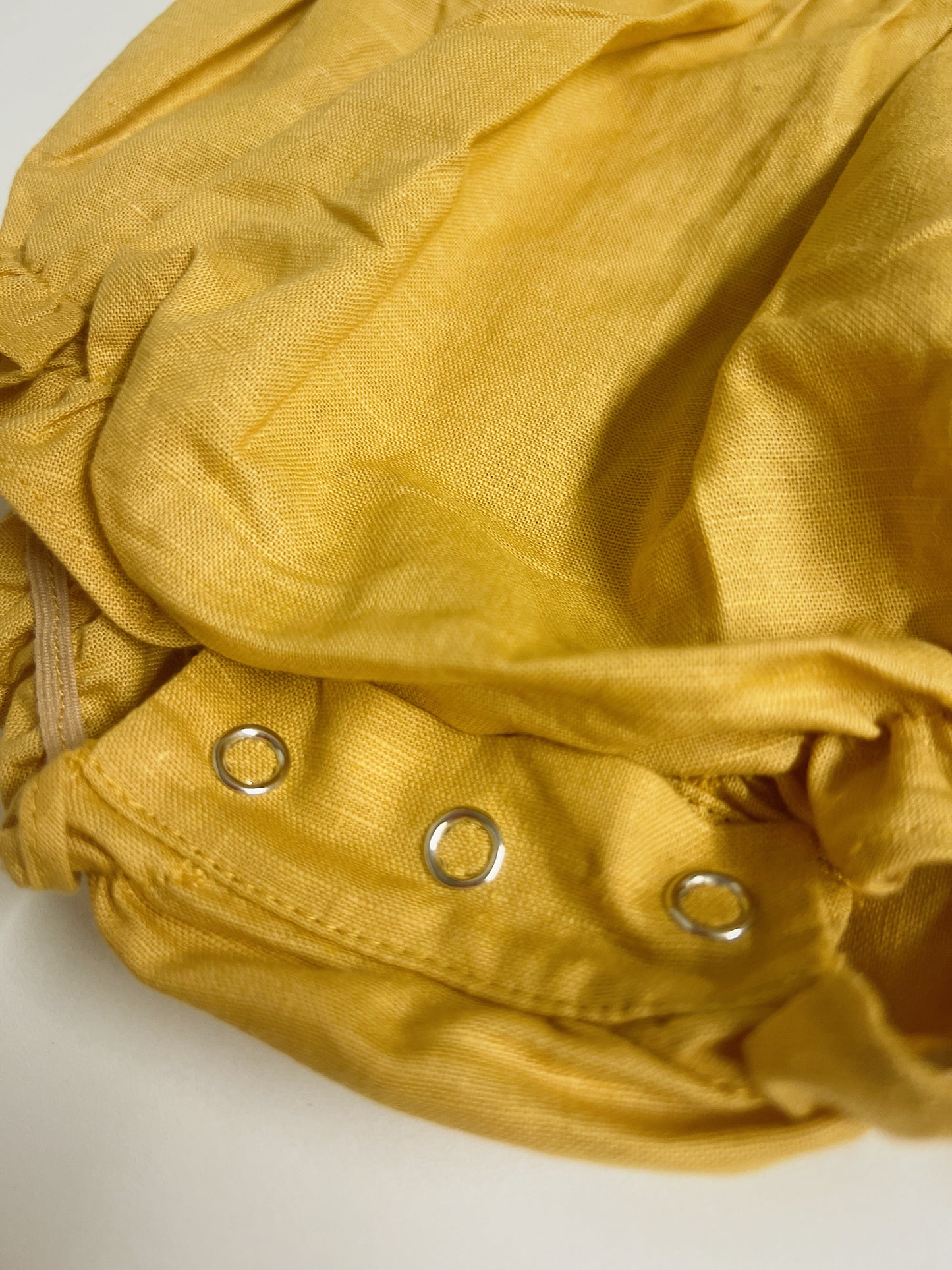 Golden Daisy | hand-embroidered linen blend romper | size 56 (0-3 months)