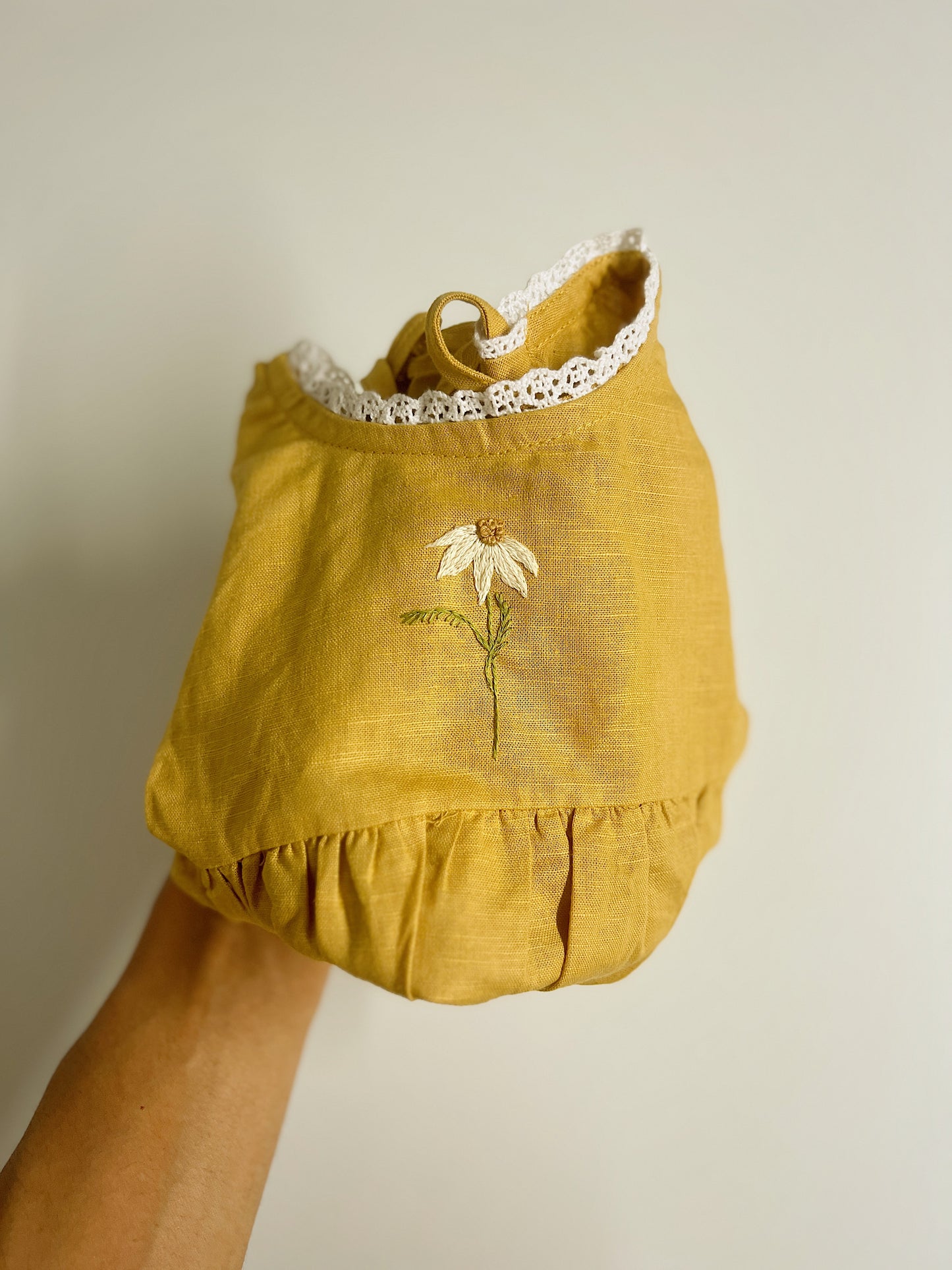 Golden Daisy | hand-embroidered linen blend romper | size 56 (0-3 months)