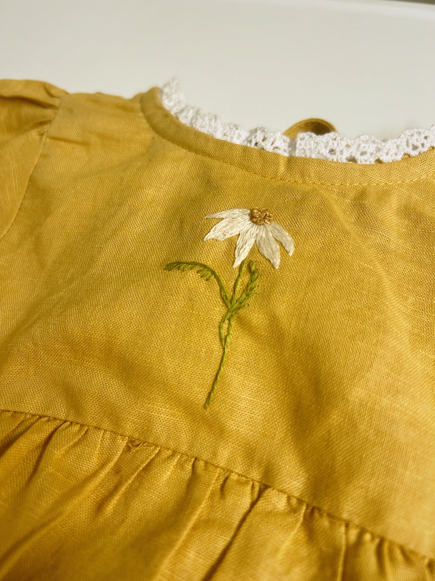 Golden Daisy | hand-embroidered linen blend romper | size 56 (0-3 months)