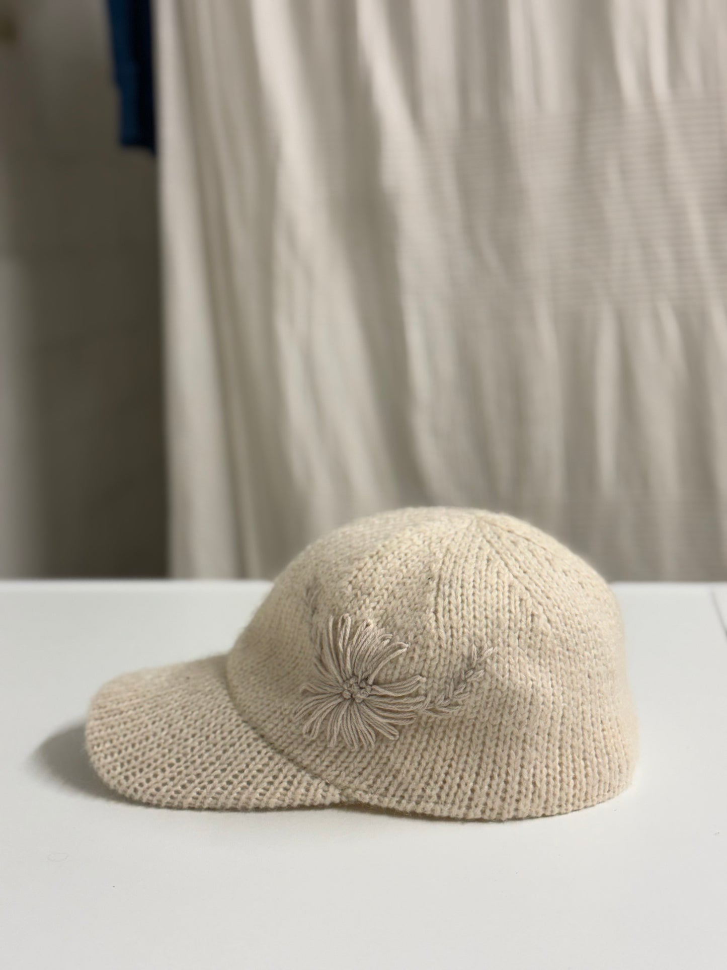 Vanilla Bloom – Hand-Embroidered Knitted Cap
