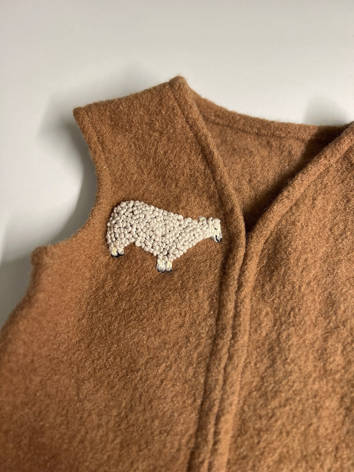 Wooly Watcher – hand-embroidered wool vest | 6–12 months