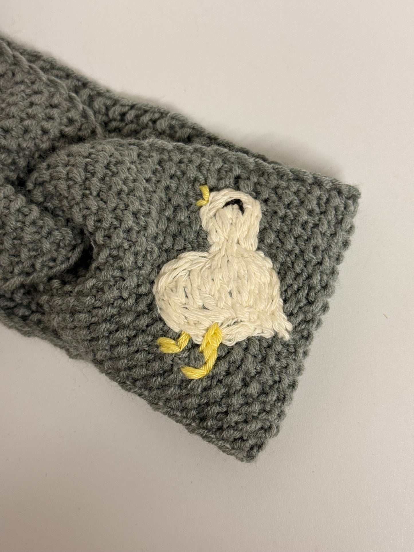 Hand-Knitted Grey Headband with Hand-Embroidered Geese