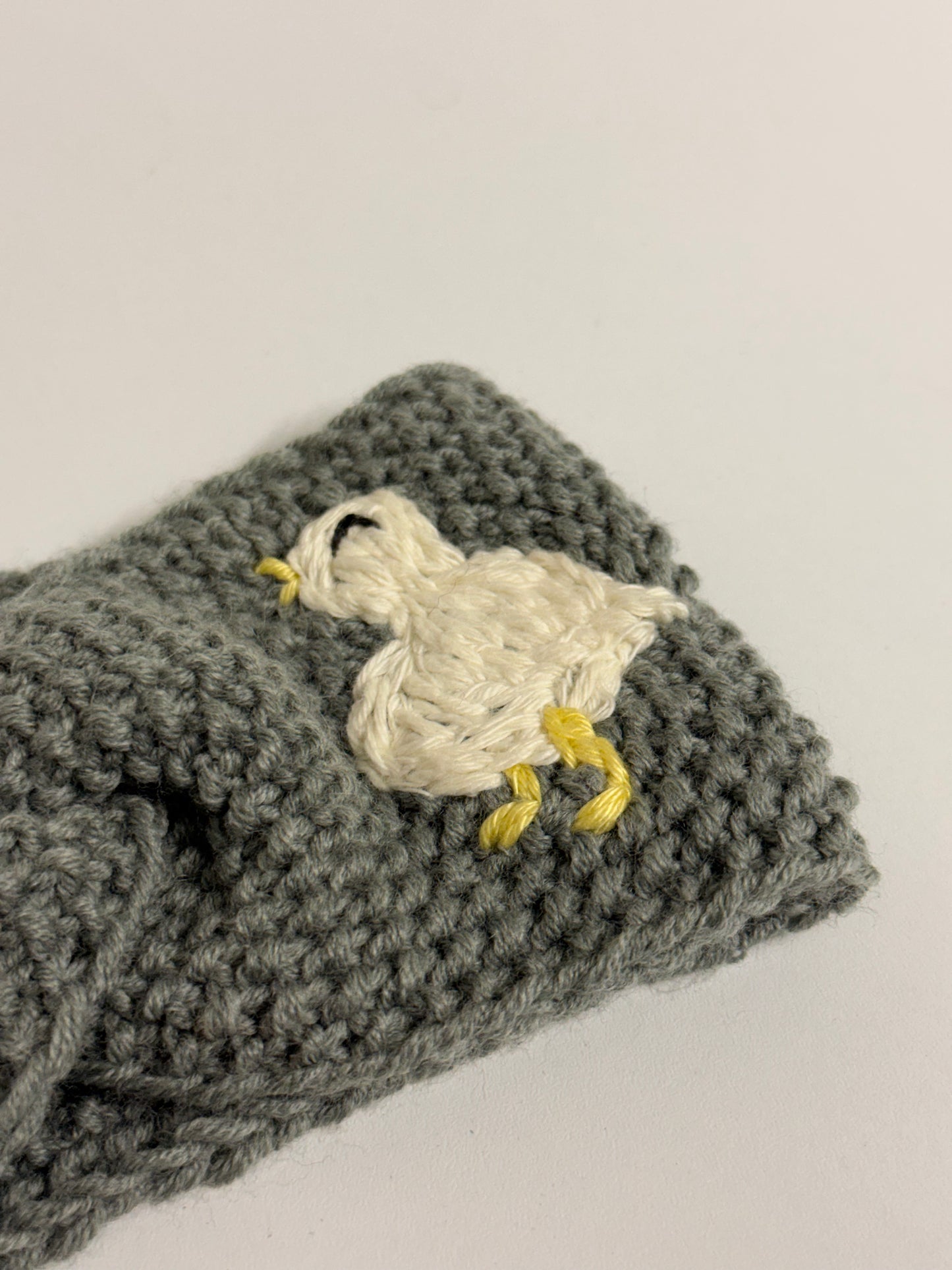 Hand-Knitted Grey Headband with Hand-Embroidered Geese