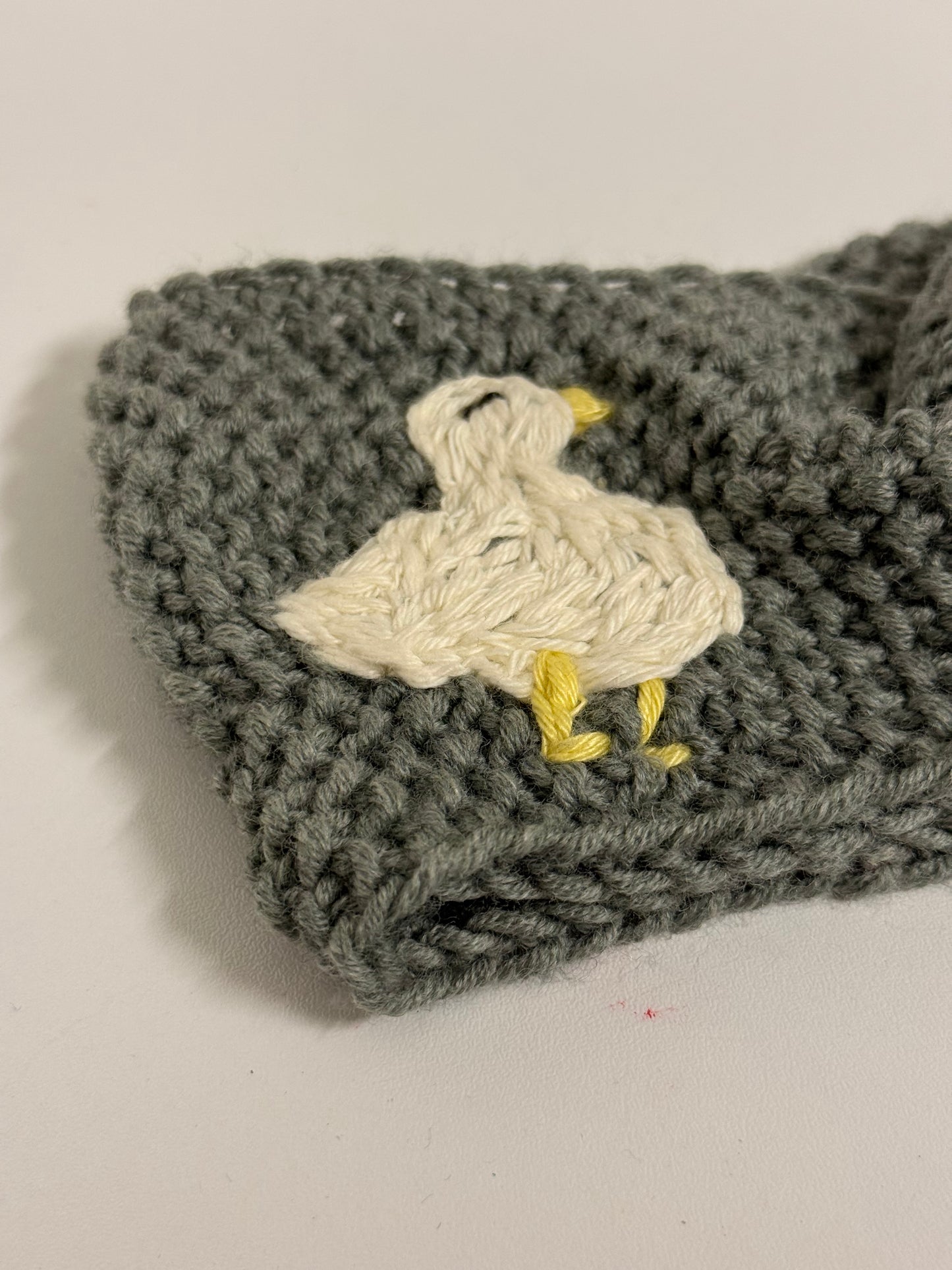 Hand-Knitted Grey Headband with Hand-Embroidered Geese